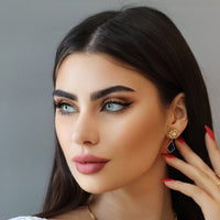 قرط المنثورة الذهبي باللون الأزرق الداكن